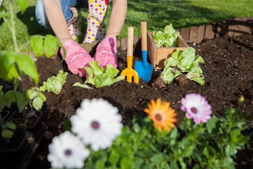 Experienced gardeners in Finsbury maintaining seasonal garden beds